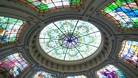 Tilt-down-of-the-stained-glass-windows-of-the-cupola-of-the-Intendencia-de-Santiago-towards-the-stairs,-current-headquarters-of-the-Presidential-Delegation,-Santiago,-Chile
