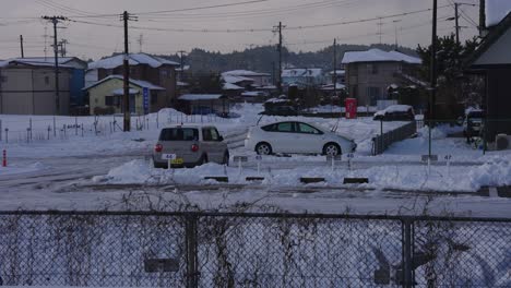 Snow-Covered-Neighborhood-in-Northern-Japan,-Winter-Establishing-Shot
