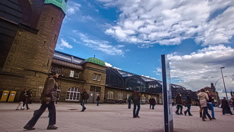 Time-lapse-shot-showing-crowd-of-public-passenger-entering-and-leaving-train-station-of-Hamburg-City---Pan-shot