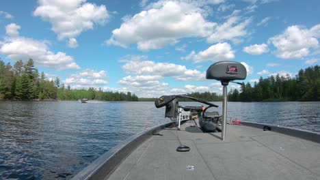 Front-end-of-bass-fishing-boat-with-butt-seat-and-trolling-motor