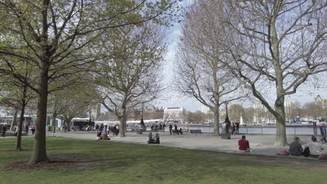 April-Spring-View-Across-Jubilee-Park-And-Garden-Beside-River-Thames-In-London-With-People-Walking-Past