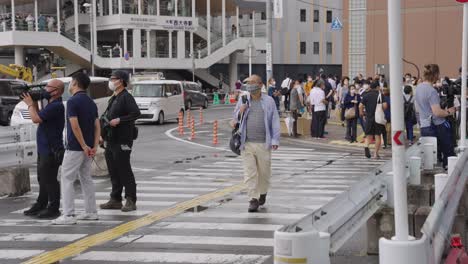 Crowd-of-Japanese-People-gather-out-by-Yamato-Saidaiji-after-Shinzo-Abe-Death