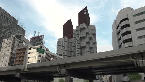 Demolition-works-continue-at-Tokyo's-iconic-Nakagin-Capsule-Tower-in-Ginza-on-April-16,-2022,-in-Tokyo,-Japan