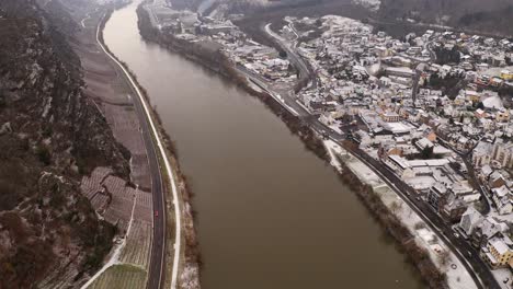 Aerial-drone-of-German-river-village-with-boat---graded