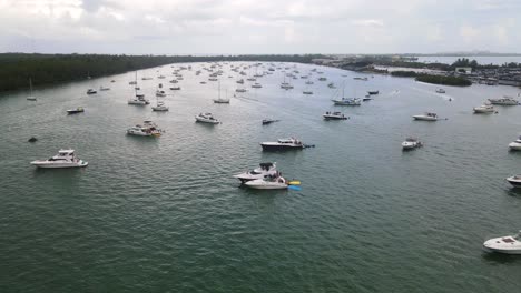 Vacation-Boats-and-Yachts-in-Ocean-on-Miami,-Florida-Coast---Aerial-Flight