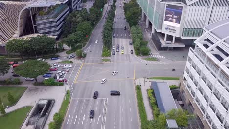 Drone-shots-of-Singaporean-streets-and-traffic,-Singapore,-UHD