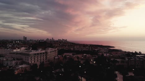 Epic-drone-shot-getting-up-above-old-Jaffo-at-sunset-4K