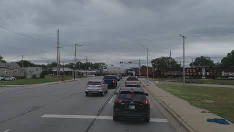 POV:-Truck-standing-still-in-front-of-the-traffic-light-in-Indiana,-United-States