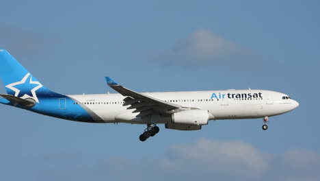 Air-Transat-Airbus-A330-commercial-aircraft,-in-flight,-exterior-with-landing-gear