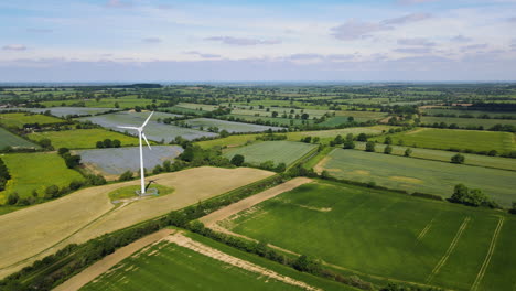 Wind-power-turbine-generating-clean-renewable-energy-in-green-English-countryside