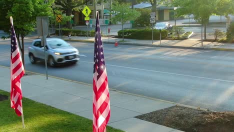 Lititz-street-during-the-sunset-on-4th-July-with-row-of-USA-flags-on-the-sidewalk