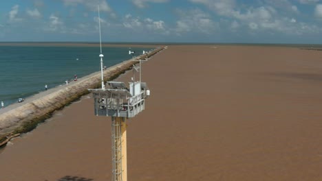 Aerial-view-of-a-weather-tower-in-the-Gulf-of-Mexico-of-the-coast-of-Lake-Jackson,-Texas