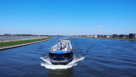 GEORG-BURMESTER-Inland-Tank-Barge-Cruising-At-River-Noord-Near-Hendrik-Ido-Ambacht,-Netherlands