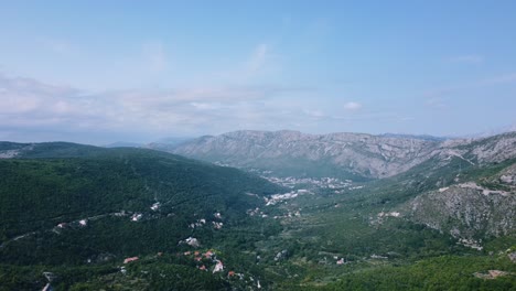 Drone-flight-over-a-mountainous-countryside-landscape,-Dinaric-Alps,-Croatia