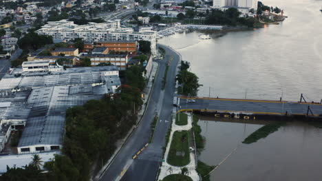 AERIAL---Bay-in-Santo-Domingo,-Dominican-Republic,-forward-descending-approach