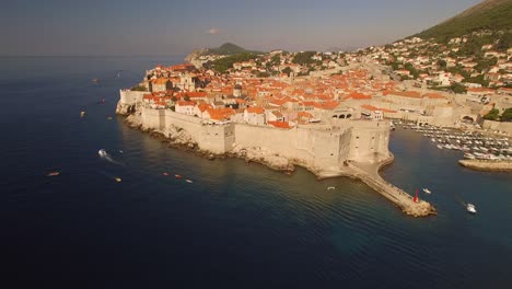Drone-panning-over-Dubrovnik-old-city-on-sunny-day