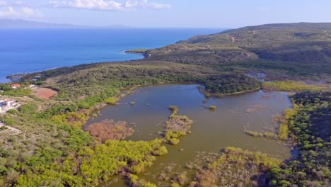 Wide-Aerial-View-of-Coastal-Mangrove-Forest-Waters-of-La-Caobita-Protected-Habitat-for-Wildlife,-Dominican-Republic