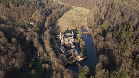 A-moated-castle-nestled-within-the-hills-of-Rhineland-Palatinate-during-golden-hour-in-winter