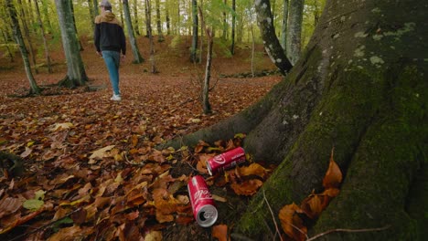 Young-Stupid-Guy-Throws-Soda-Cans-in-The-Nature,-Gyllebo,-Skåne,-Sweden---Static-Wide-Shot