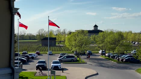 Ontario-Flag-waving-in-wind-at-Peller-Estates-Winery-And-Restaurant,-Canada