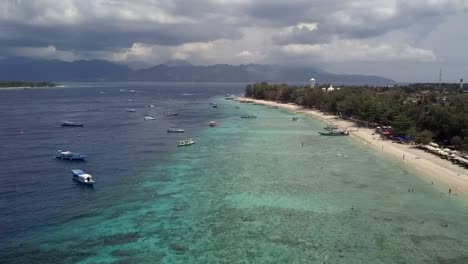 Vacation-paradise-turquoise-crystal-clear-water-Unbelievable-aerial-view-flight-panorama-overview-drone-footage-of-Gili-Trawangan-beach-bali-Indonesia-2017-Cinematic-view-from-above-by-Philipp-Marnitz