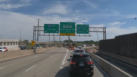 Traveling-in-Illinois-State-Tollway-roads-and-streets-construction-slow-traffic-at-rush-hour-off-ramp