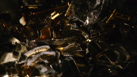 Close-up-of-golden-plastic-waste-ready-to-be-recycled