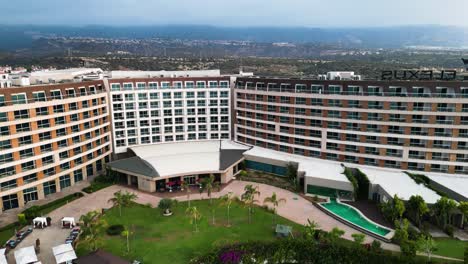 An-aerial-view-of-an-outside-view-of-a-luxury-hotel-and-it's-surroundings
