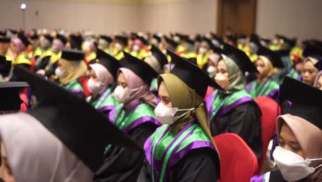 Crowd-image-of-students-at-graduation-ceremony-from-from-the-side