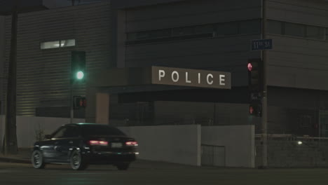 Circa-2022s-August,-Los-Angeles,-United-States:-cars-crossing-the-green-light-and-zebra-crossing-stripes-at-night