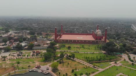 Aerial-Over-Green-Gardens-Next-To-Badshahi-Mosque-In-Pakistan
