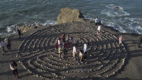 Static-Shot-of-People-Enjoying-the-Land's-End-Labyrinth-in-San-Francisco-During-a-Cool-Evening