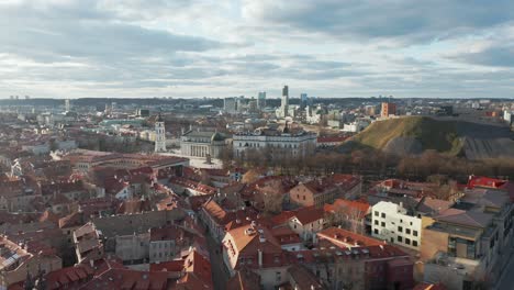 AERIAL:-Vilnius-Old-Town-During-Golden-Hour-with-Panorama-Reveal
