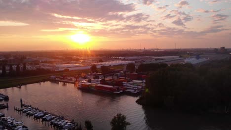 Golden-Yellow-Sunset-Over-Cargo-Container-Transfer-Facility-In-Ridderkerk