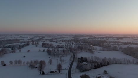 Push-in-Over-a-Snow-covered-Countryside-Before-Sunrise