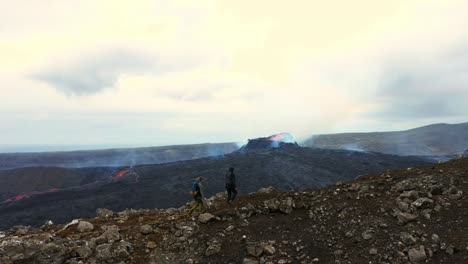 Hikers-At-Fagradalsfjall-Volcano-During-Eruption-In-Iceland---aerial-drone-shot