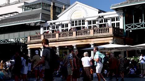 Time-lapse-looking-up-towards-the-Punch-and-Judy-Rooftop-Pub-and-crowds-of-people-at-the-Covent-Garden-market