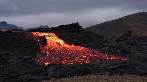 Primordial-natural-landscape-with-lava-river-flowing-rapidly