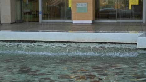 Close-Up-Of-Fountain-Water-Falling-And-Splashing-At-Pier-South-Resort