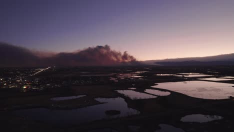 Drone-Aerial-View-Of-Marshall-Fire-In-Boulder-County-Colorado-Wildfire-Smoke-At-Golden-Hour-Evening-Time