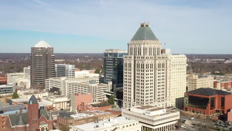 Greensboro,-North-Carolina-downtown-buildings-skyline-with-drone-video-moving-up-close