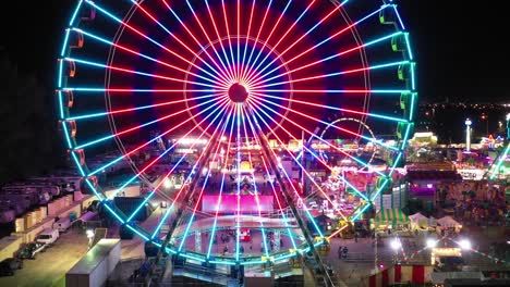 An-aerial-view-of-the-colorful-ferris-wheel-in-Santa's-Enchanted-Forest