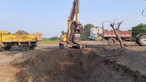 An-excavator-is-digging-and-cutting-construction-land