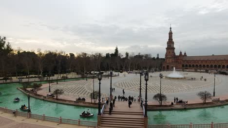 Slow-motion-pan-across-Plaza-Espana-in-Seville,-Spain