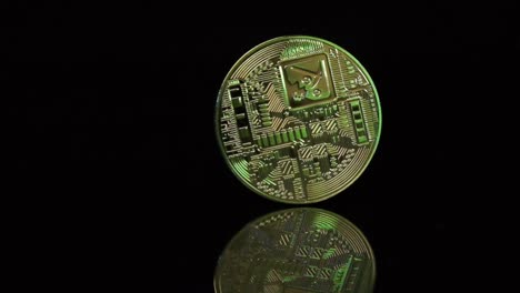 Slow-motion-Bitcoin-Spinging-on-Black-background,-Close-up