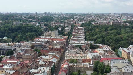 City-skyline-of-old-European-buildings-in-Lviv-Ukraine-with-cars-driving-on-the-main-road