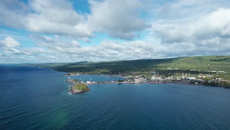 High-elevation-drone-view-of-a-boat-harbor-on-a-beautiful-summer-day