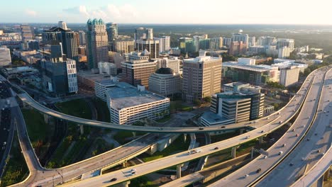 4K-aerial-panning-clip-of-downtown-Orlando-skyline-during-golden-hour-sunrise