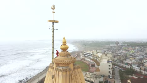 Aerial-backward-moving-shot-of-Somnath-Mandir