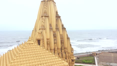 Aerial-backward-moving-shot-of-Somnath-Mandir